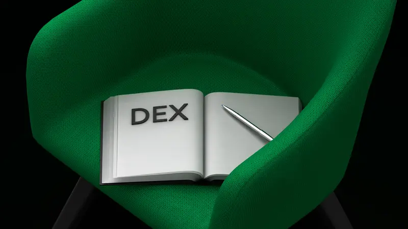 An open book with DEX printed on the page and a silver pen, resting on a green armchair against a dark background